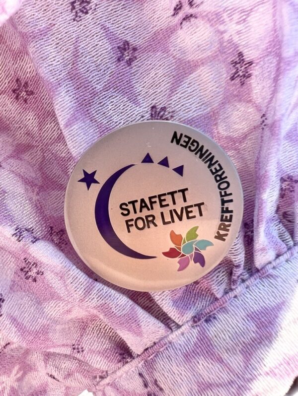 Støtt Kreftforeningens Stafett for livet og arbeidet med å kjøpe en Stafett for Livet pin.